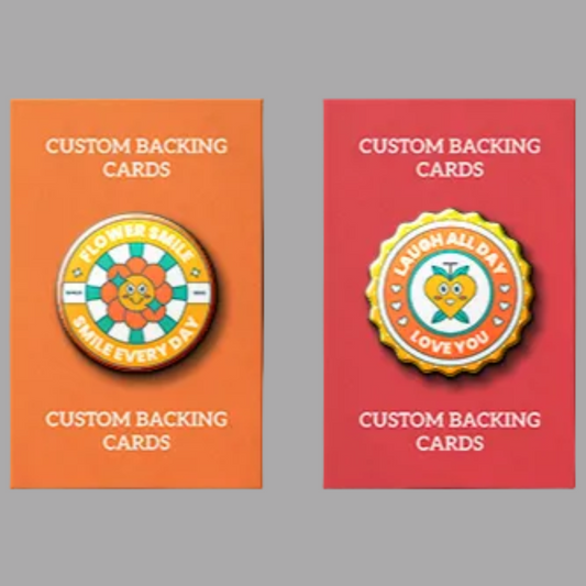 Two custom backing cards with colorful designs on a gray background.
