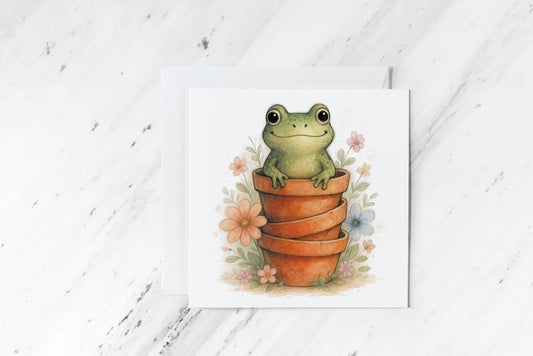 Frog in Flower Pots Greeting Card – Whimsical Cottagecore Watercolour Art – Cute Amphibian Stationery – Nature-Inspired Handmade Card