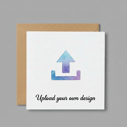 A white square card with a brown kraft envelope behind it, featuring a blue and purple watercolor upload arrow icon and the text 'Upload your own design' in black script.