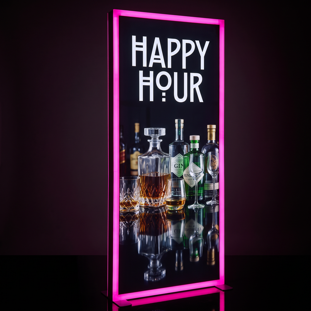 A vertical illuminated bar sign with a bright pink neon border, displaying the words “HAPPY HOUR” in large white letters above a photo of assorted liquor bottles and glasses on a dark background.