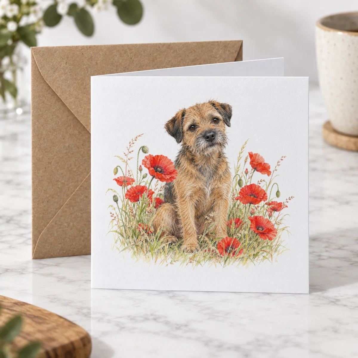 Border Terrier Among Scarlet Poppies Greeting Card – Hero