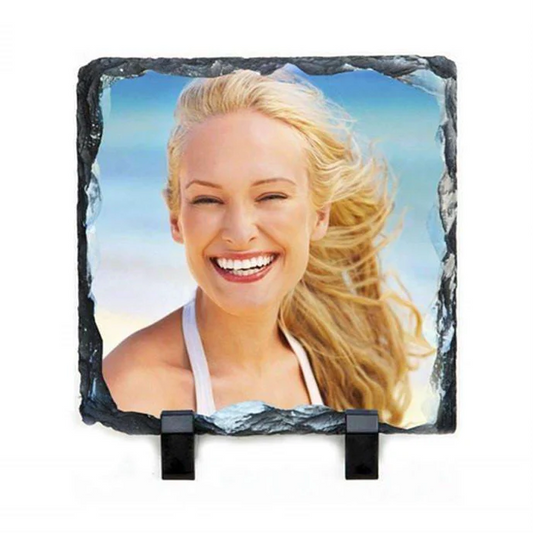 Product shot (no photo printed yet):
“Blank 15x15cm photo rock slate with display stand, ready for custom printing.”

Slate with a family photo printed:
“Personalised 15x15cm photo slate with a printed family portrait, displayed on a black stand.”

Slate with a wedding photo:
“Custom printed wedding photo on a square rock slate, perfect as a unique wedding keepsake gift.”

Slate with a holiday/landscape photo:
“Scenic holiday photo printed on a square stone slate with natural edges, displayed on a stand.”