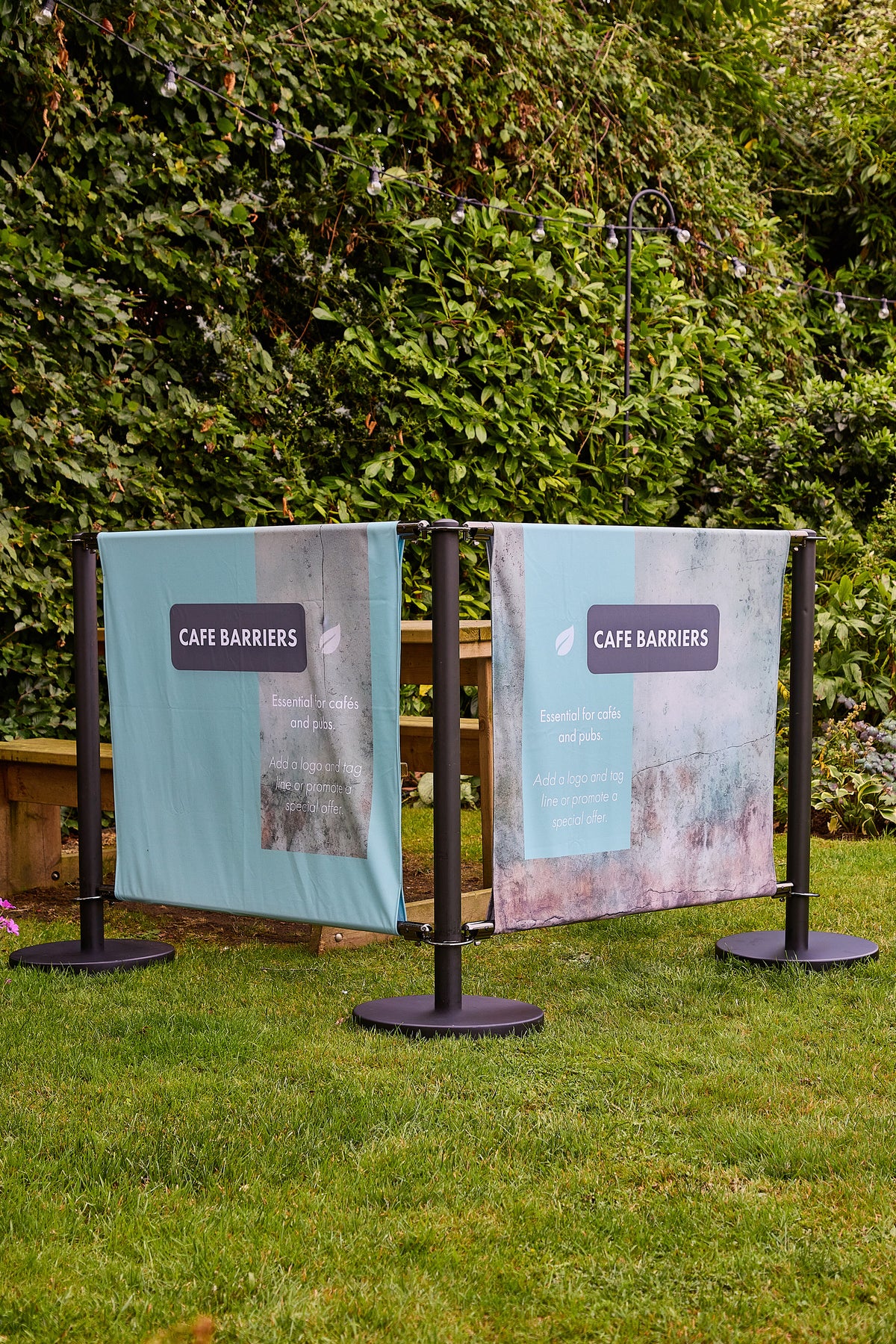 Black Cafe Barrier system outside a cafe