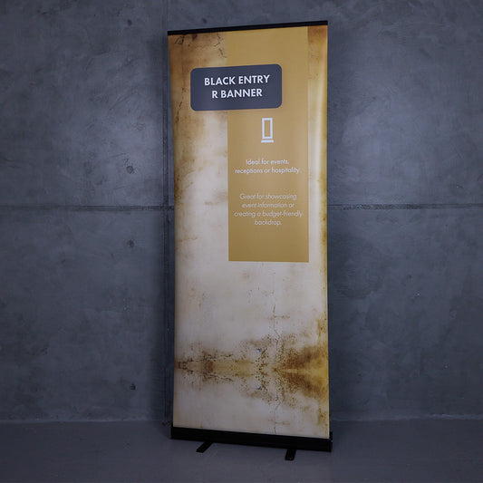 Black Entry roller banner displayed with a printed graphic