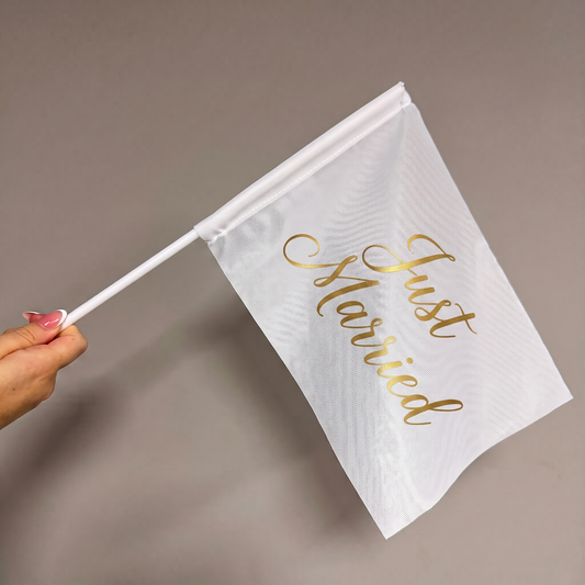 Custom hand waving flag with Just Married wedding artwork on a white handheld pole.