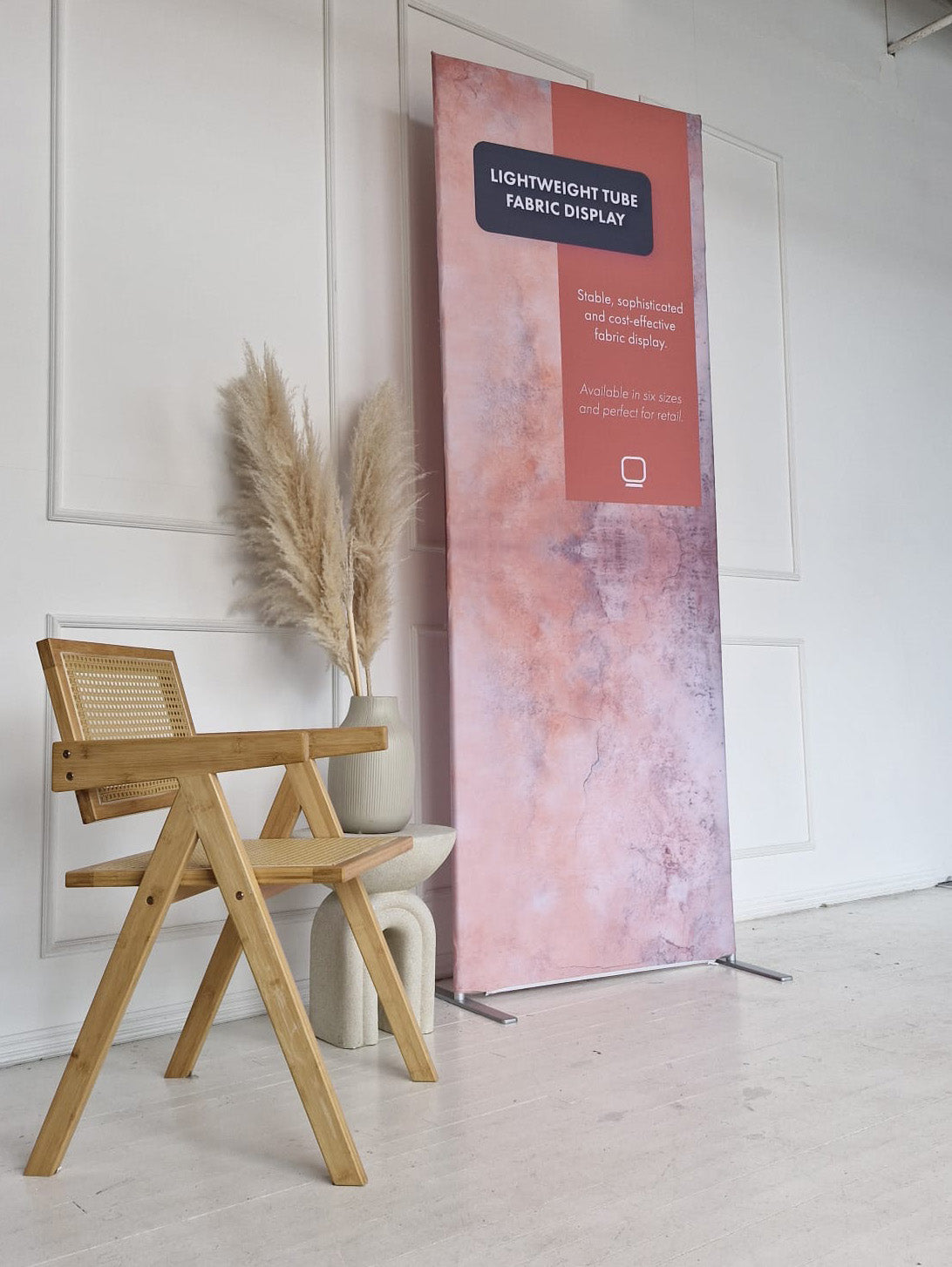 Lightweight tube fabric display in an interior setting