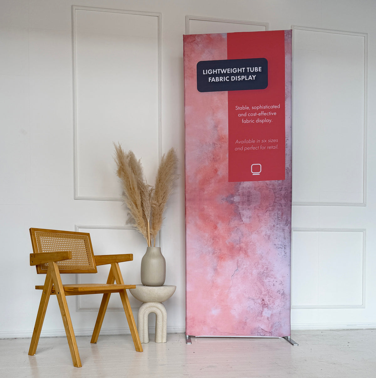 Portable lightweight tube display shown in a styled interior