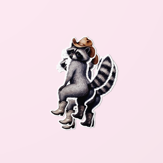 Funny cowboy raccoon vinyl sticker wearing boots and hat, cheeky animal design on pink background
Cheeky cowboy raccoon sticker for laptops, water bottles & scrapbooks. Premium waterproof vinyl, vivid print, and hilarious western charm.
